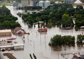 Aerial view of Burlington, North Dakota inundated with flood waters from the Souris River on June 25, 2011