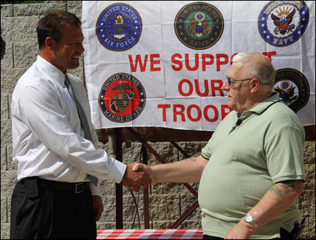 Rep. Shuler presents long-overdue medals and awards to Waynesville veteran David Gifford.