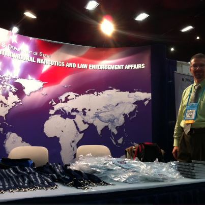 Photo: Setting up INL's information booth at the annual conference for the  International Association of Chiefs of Police (IACP), Sept 29th and 30th 2012 in San Diego, California