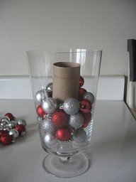 Remember to use a toilet paper roll as a filler- makes ornaments go further in filling vases!