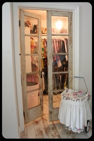 LOVE - Old doors re-purposed for closet doors.