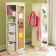 Get a cheap shelf from Ikea. Attach a mirror and cork board and put it on top of a lazy susan (also from Ikea).