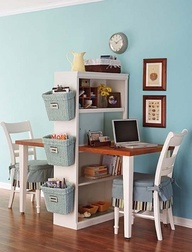 Great idea: Take one table, cut in half, attach to bookcase ~ nice idea for a small space.