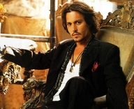 I don't care if he's dressed as a gay pirate or has a million pairs of shears in his hands...there's something about Johnny Depp that is wild, sexy and lovely.