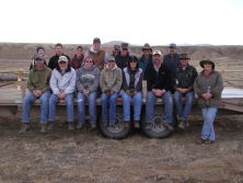 BLM Range Management Specialist Tricia Hatle (4th from left) and volunteers relax after completing wildlife habitat improvements in the McCullough Peaks Herd Management Area.