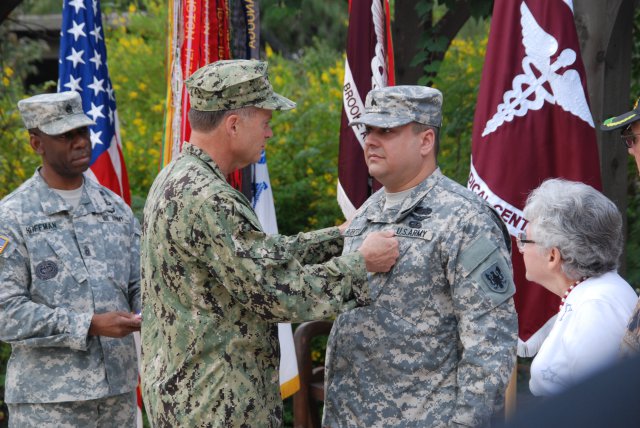 Navy Adm. James A. Winnefeld Jr., vice chairman of the Joint Chiefs of Staff, pins the Purple Heart on Sgt. Paul Roberts during a ceremony at the Warrior and Family Support Center on Fort Sam Houston in San Antonio, Oct. 12, 2012. Roberts was injured Nov. 24, 2011, while supporting Operation Enduring Freedom. Winnefeld also presented a Purple Heart to Spc. Jason Smith, who was injured July 25, 2012, while supporting OEF. After the ceremony, Winnefeld visited with wounded warriors in San Antonio Military Medical Center and Center for the Intrepid, a state-of-the-art rehabilitation center.