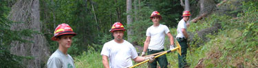 Construction interns working on a CCSP project.