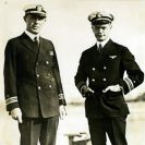 Photo: Lieutenant Commander Virgil C. Griffin Jr. USN, (left) and Lieutenant Commander Godfrey C. Chevalier, USN, (right) on board USS Langley (CV-1) in 1922.  On 17 October 1922, Griffin made the first takeoff from Langley and on 26 October Chevalier made the first landing on her.  Courtesy of Lieutenant Gustave Freret, USN, (Retired), 1972.   Note:  The donor commented that Griffin, who was from Alabama, had “You All” as a nickname.   NHHC Photograph Collection, NH 76210.