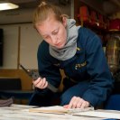 Photo: 121013-N-NU634-425 ARABIAN SEA (Oct. 13, 2012) – Ensign Corey Schulz, from Oak Harbor, Wash., plots fire boundaries during a general quarters drill aboard the guided-missile cruiser USS Hue City (CG 66).  Hue City is deployed to the U.S. 5th Fleet area of responsibility conducting maritime security operations, theater security cooperation efforts and support mission as part of Operation Enduring Freedom.  (U.S. Navy photo by Mass Communication Specialist Seaman Darien G. Kenney/Released)