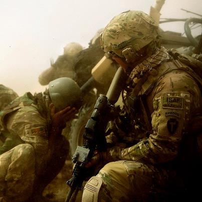 Photo: U.S. Army Staff Sgt. James Bates, with Provincial Reconstruction Team Farah, attempts to avoid flying debris kicked up by a CH-47 Chinook helicopter, while on security at the landing zone in Pur Chaman district, Farah province, Afghanistan, Sept. 26, 2012. The mission marks the first time coalition forces have been to the Pur Chaman district in more than a year. (DoD photo by Staff Sgt. Jonathan Lovelady, U.S. Air Force/Released)