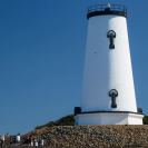 Photo: Lots of folks toured the Light Station this weekend. Here, one group near the newly painted lighthouse.