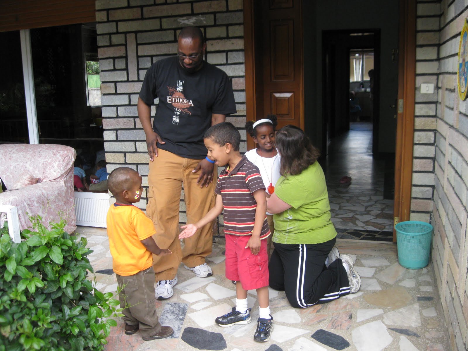 Ken & Heidi welcome newly adopted daughter and son, Tensaye (age 5) and Millennium (age 2).