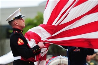 Military Man with Flag