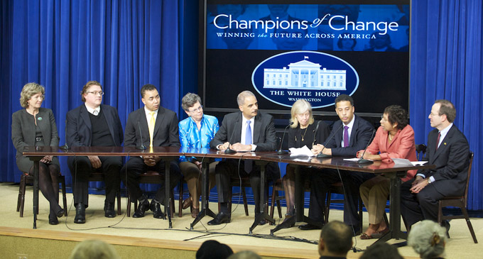 Attorney General Eric Hold moderates a panel discussion