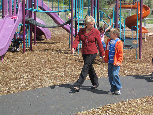 FNS Administrator Julie Paradis hits the track with a Lolo Elementary student as part of the school’s Mileage Club.