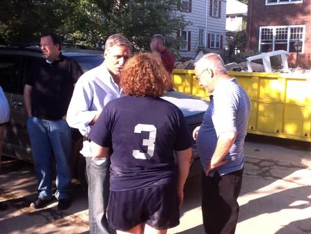 Rep. Barletta and West Pittston Mayor Tony Denisco speak with a flood victim Monday afternoon