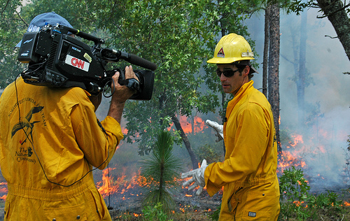 CNN news and weather anchor Rob Marciano highlights multi-agency partnerships and the benefits of prescribed fire during a visit to Bristol, Fla., hosted by The Nature Conservancy on Tuesday, June 19, 2012. Prescribed fire is integral in improving forest health and is one of the most effective tools used 