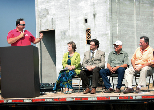 Kyle Oldre, Rock County Administrator speaks at the dedication as State Director Colleen Landkamer and other dignitaries look on.