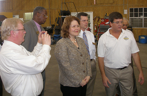 USDA Administrator for Rural Business and Cooperative Programs, Judy Canales (center);  Rural Development State Director, Clarence W. Hawkins (second from left)  and other officials tour the Game Equipment manufacturing plant. 