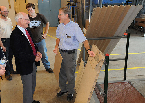 USDA Under Secretary Harris Sherman (front left) meets with FPL researcher John Hunt (front right) as representatives from FPL partner Noble Environmental Technologies look on (in background,  Jim Jensen and Caleb Walker). 