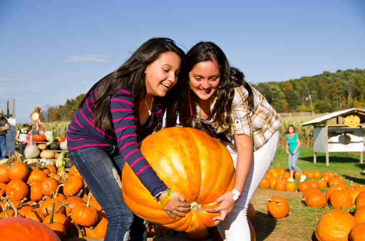 Girls with Large Pumpkin