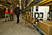 A Canine Officer routinely checks a warehouse with a bomb sniffing dog.