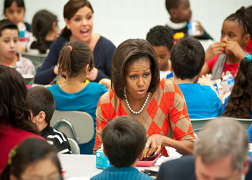 First Lady Michelle Obama joined Agriculture Secretary Tom Vilsack and celebrity cook Rachel Ray at Parklawn Elementary School in Alexandria, Virginia, on Wednesday, January 25, 2012 to speak with faculty and parents about the United States Department of Agriculture’s new and improved nutrition standards for school lunches.