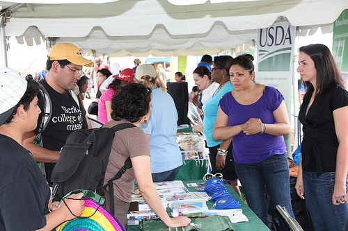 Welcoming visitors to our Somos Uno: We’re One USDA booth