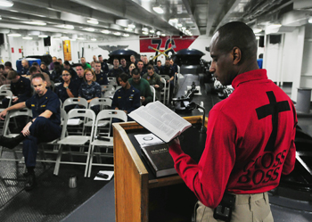 Picture of Chaplain reading the Bible