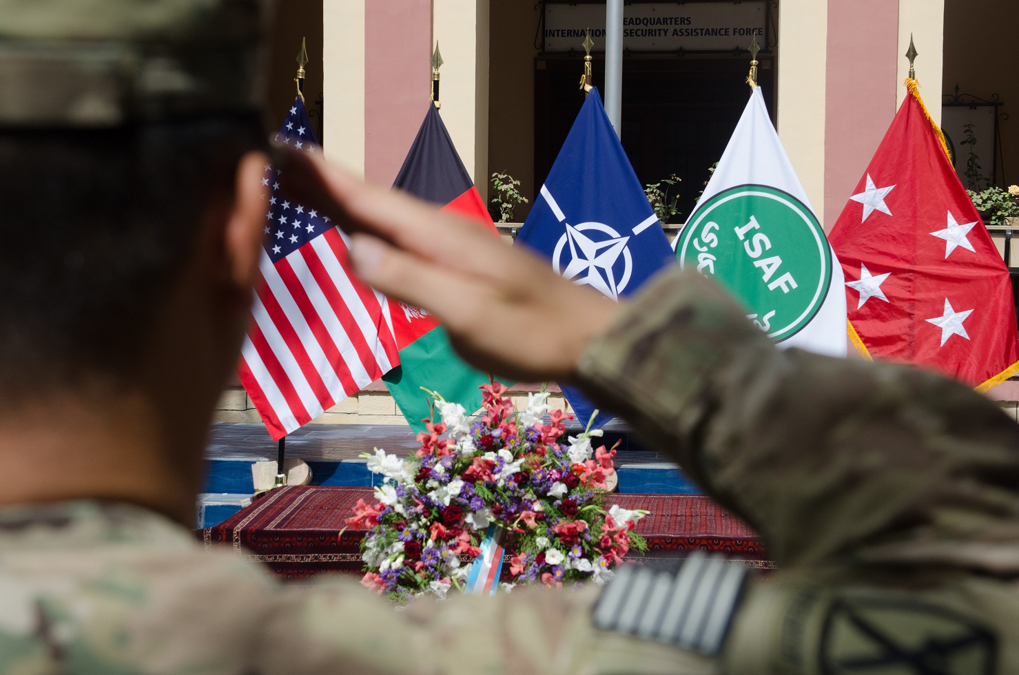 U.S. Soldier renders salute during the 9/11 ceremony at HQ ISAF, Kabul. (U.S. Army photo by Sgt. Christopher Harper)