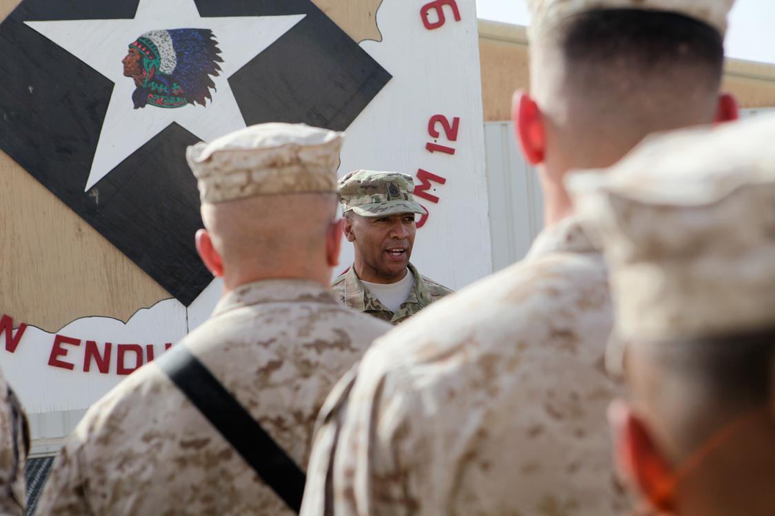 Command Sgt. Maj. Thomas Capel, command senior enlisted for the International Security Assistance Force-Afghanistan, talks to Marines with Regimental Combat Team 6, Sept 26, 2012. Capel talked to the Marines about progress made in Helmand province by Marines and thanked them for their service. (Photo by Cpl. Ed Galo)