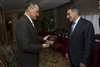 Minister of Defense Jose Atilio Benitez Parada presents a plaque to Secretary Panetta 