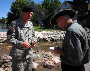 This is a picture of me getting interviewed by an Associated Press reporter, with the sandbag levee behind us