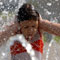 Russian girl cooling off in fountain (AP Images) 