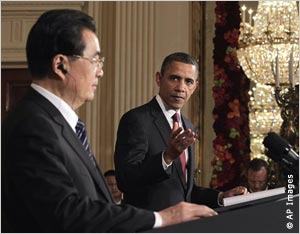 Hu Jintao and Barack Obama at podiums (AP Images)