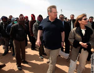 Assistant Secretary Schwartz and USAID Assistant Director Lindborg at refugee camp (AP Images)