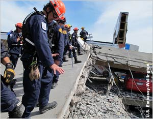 Los Angeles rescuers surveying collapsed parking gargage (U.S. Embassy Wellington)