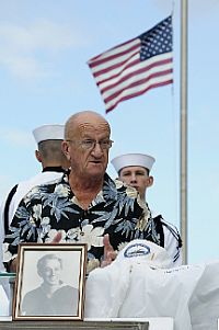 Retired Master Chief Yeoman Jim Taylor, a volunteer at Commander, Navy Region Hawaii Public Affairs,