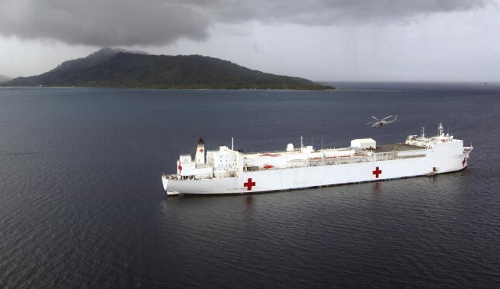 The Military Sealift Command hospital ship USNS Mercy (T-AH 19) sits anchored off the island of Weno, Chuuk State, Federated States of Micronesia, Aug. 24, 2008. Mercy is participating in Pacific Partnership 2008, a multinational exercise with nongovernmental organizations and joint services that provides local communities with various medical, dental and engineering services. DoD photo by Mass Communication Specialist 2nd Class Mark Logico, U.S. Navy. (Released)