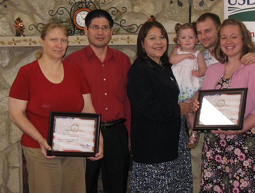 USDA Rural Housing Administrator Tammye Trevino (Center) in Plattsmouth, Nebraska with homeowners Jal Angelsson and Susan Ramirez ( to Ms. Trevino’s left) and Emmelynn, Robert and Kendra Green. 