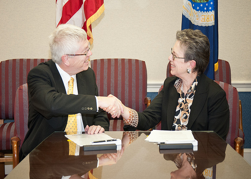 Trevor Nichols (left), Chief Executive Officer, Centre for Agricultural Bioscience CABI-Plantwise and Dr. Catherine Woteki (right), Undersecretary, Research Education and Economics signed a Memorandum of Understanding to make the United States Department of Agriculture’s research and genetic information accessible to “plant doctors” working to prevent disease and pests in developing countries at the United States Department of Agriculture in Washington, D.C., on Tuesday, February 7, 2012.