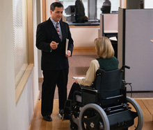 Business Man, Business Woman in Wheelchair