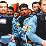 Afghan National Civil Order Police recruits watch a member of their graduating class receive his certificate during an ANCOP graduation ceremony at National Police Training Center Wardak, Aug 24. (Air Force Master Sgt. Quinton T. Burris)