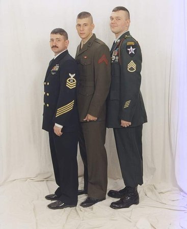 Stan and Shirley White’s three sons: (from left) William, Navy; Andrew R, Marines; and Robert, Army. The family photo was taken at Christmas 2004, the last time the brothers were together. Andrew, who was discharged with PTSD, died in 2008.