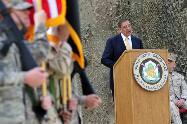 Secretary of Defense Leon Panetta talks to U.S. service members during a flag casing ceremony that marked the end of Operation New Dawn, at the former Sather Air Base, in Baghdad, Iraq, Dec. 15, 2011. Since 2003, more than 1 million Airmen, Soldiers, Sailors and Marines have served in Iraq.