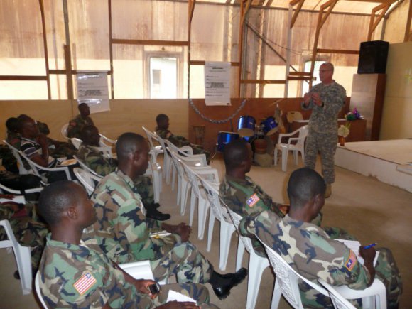 U.S. Army Africa Chaplain (Col.) Jonathan McGraw discusses combat stress control with Armed Forces of Liberia Chaplains. The combat stress symposium, which is very timely since the AFL have recently initiated their first deployment of troops, helped the soldiers learn to deal with the effects of combat and allowed the USARAF chaplains continue to build their relationship with Liberia.