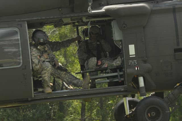 Several Army Reserve Soldiers from the 320th Military Police Company of St. Petersburg, Fla., were given the opportunity to be a "casualty" and litter bearers during a joint Reserve and Florida Army National Guard medevac operation at Camp Blanding, Fla., July 20, 2012.