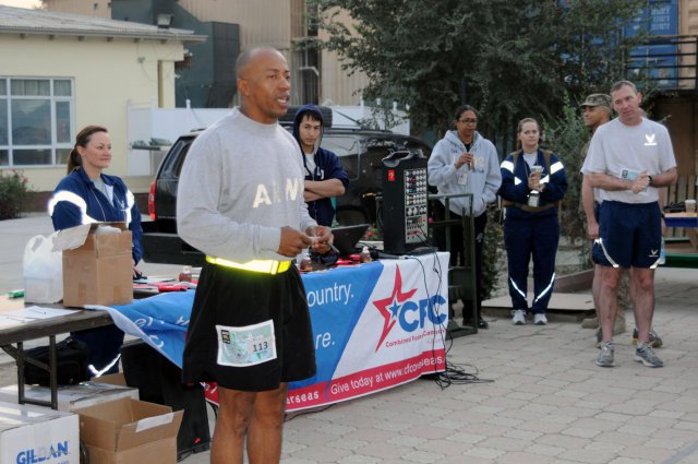 Command Sgt. Maj. Terry E. Parham Sr., the senior noncommissioned officer for both the Deputy Commander of Support Operations, NATO Training Mission-Afghanistan and the 13th Expeditionary Sustainment Command, addresses participants of the Camp Eggers Army Ten-Miler shadow run, Oct. 7, 2012. More than 200 signed up, representing the coalition forces stationed at this particular location. Working closely with the organizers of the Army Ten-Miler in Washington, D.C., Parham with the help of the Camp Eggers Morale, Welfare and Recreation office was able to secure Army Ten-Miler shadow run T-shirts for the participants.