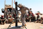 U.S. Soldiers Teach Iraqi Soldiers about Mortar System