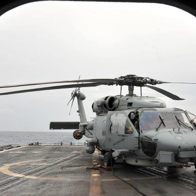 Photo: CARIBBEAN SEA (Oct. 3, 2012) – Aviation Structural Mechanic 3rd Class (AW) Randolph Vasquez removes the air intake covers from an SH-60B Sea Hawk helicopter assigned to Helicopter Anti-Submarine Squadron Light Four Eight (HSL 48) on the flight deck of the Oliver Hazard Perry-class guided-missile frigate USS Underwood (FFG 36). Underwood is deployed to Central and South America and the Caribbean in support of Operation Martillo and U.S. 4th Fleet’s mission, Southern Seas 2012. (U.S. Navy photo by Mass Communication Specialist 3rd Class Frank J. Pikul/Released)